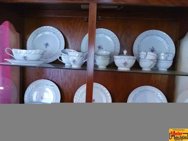 China in the Upper Part of China Cabinet & Additional Pieces in Bottom Closed Cabinet and Drawer image