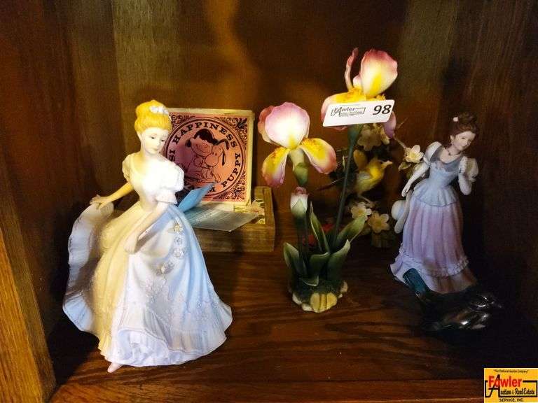 Contents of Shelf in Entertainment Center: Figurines & More image