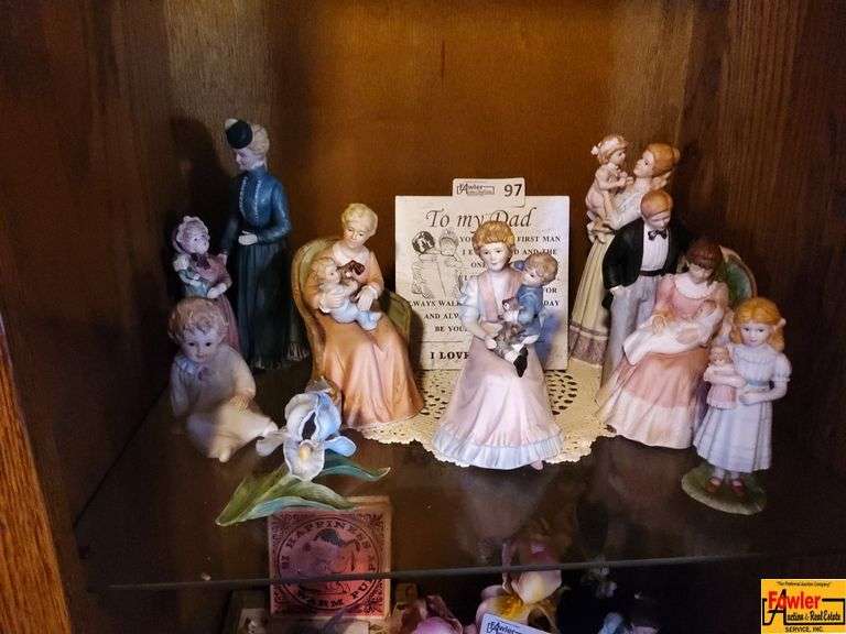 Contents of Shelf in Entertainment Center: Figurines & More image
