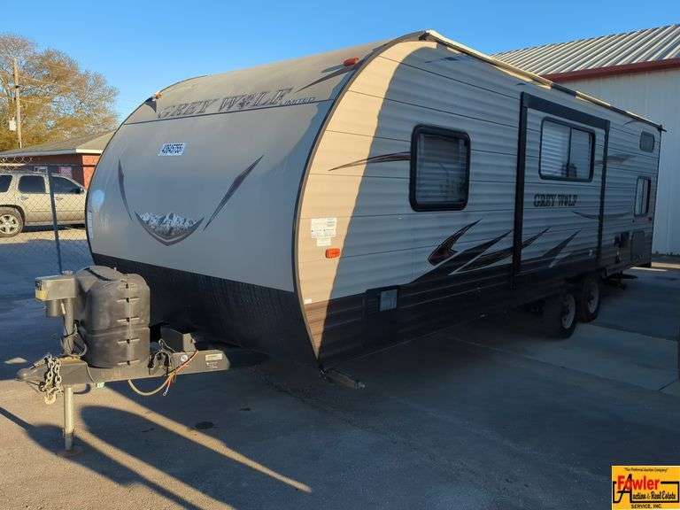 2016 Grey Wolf Limited Camper by Forest River, Wildwood EVO Series; VIN 4X4TCKY21GK036276 - Rebuilt Salvage Title image