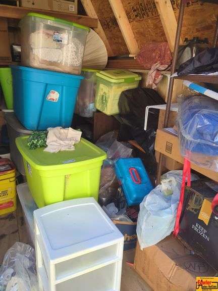 Contents Of Shed:  Totes Of Miscellaneous, Small Table, Rake, Fence Wire image