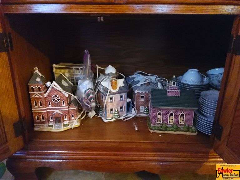 Contents of Lower Cabinet in China Cabinet: Christmas Houses ( The China on the Other Side of This Cabinet is Sold in Lot 116) image