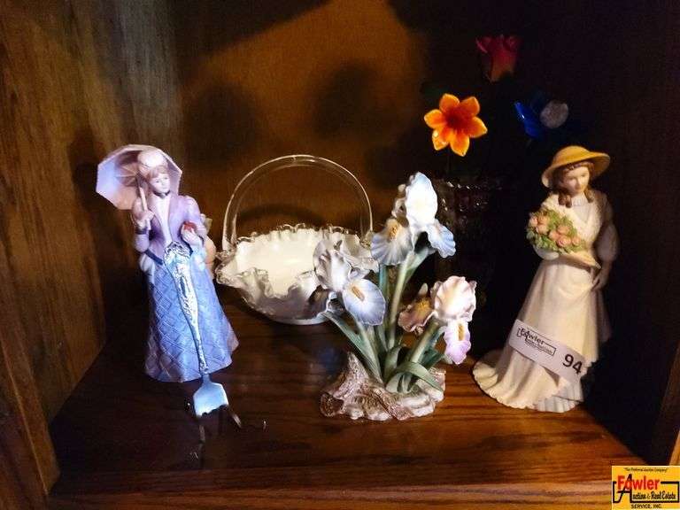 Contents of Shelf in Entertainment Center: Figurines & More image