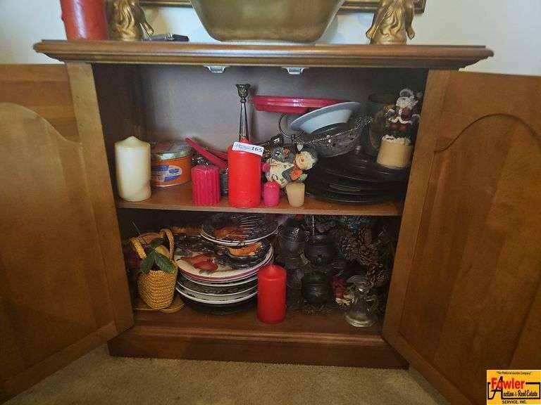 Decorative Items and Plates inside of Wooden Cabinet image
