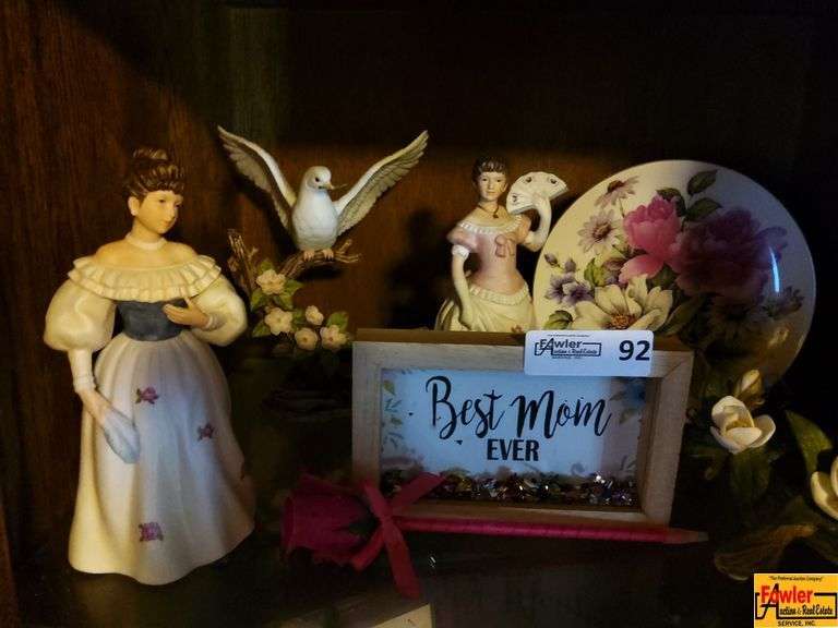Contents of Shelf in Entertainment Center: Figurines, Decorative Plate & More image