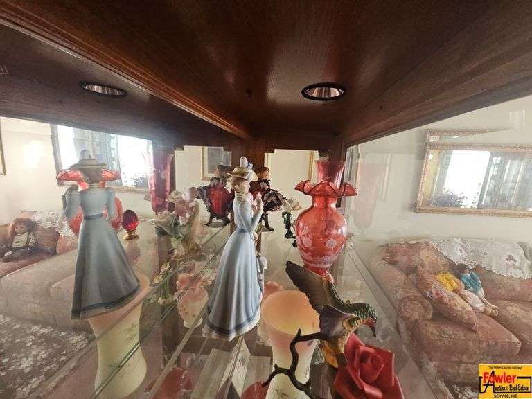 Contents on Top Shelf of Curio Cabinet image