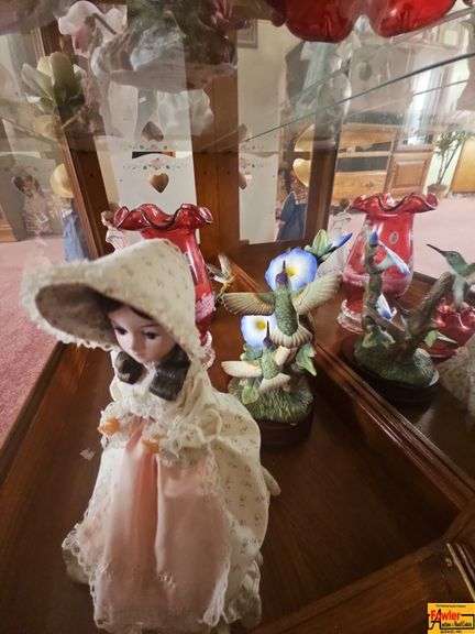 Contents on Bottom Shelf of Curio Cabinet image