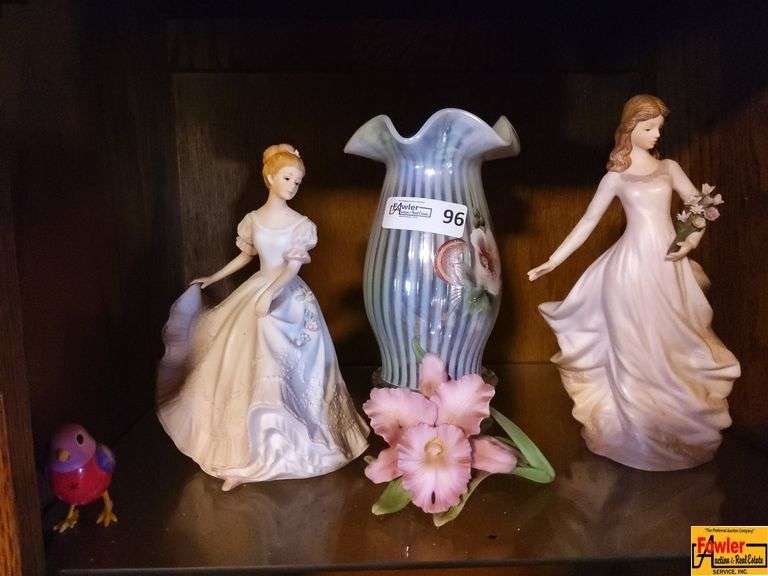 Contents of Shelf in Entertainment Center: Figurines & Vase image