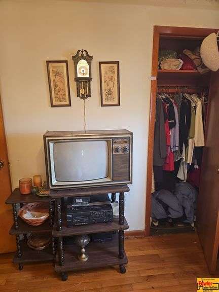 Magnavox TV with Rolling Stand, Emerson AS2609 Radio/Cassette Player, and Assorted Home Goods image