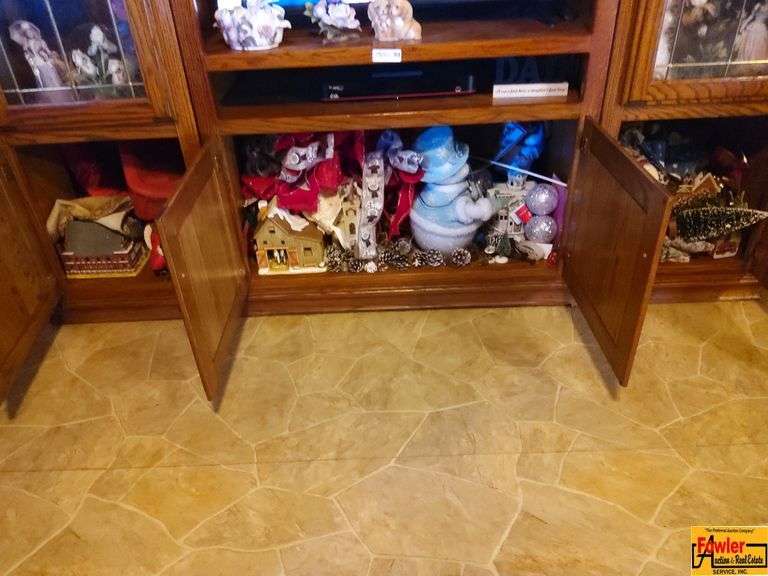 Contents of Closed Cabinets in Entertainment Center: Christmas Decor image