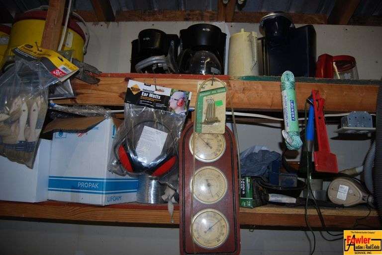 Shelf Contents with Coolers, Boots, Coffee Makers, and More image