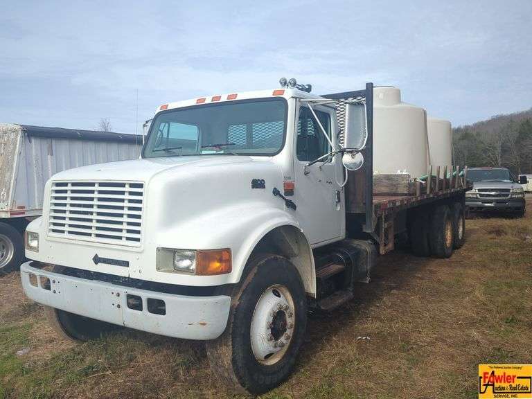 2001 International 4900 DT 466E Flatbed With Water Tanks; 32,941 Miles; VIN 1HTSHAAR91H331251; Bill Of Sale Only image