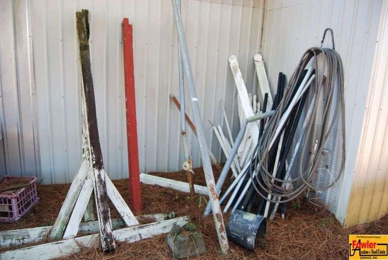 Mixed Lot of Metal and Wood - Includes Poles, Boards, and Hoses image