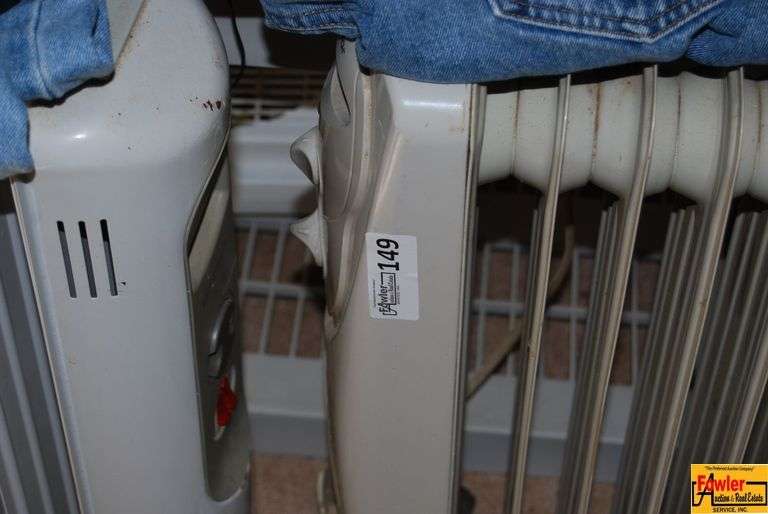 Lot of Three Electric Heaters and a Shark Handheld Vacuum image