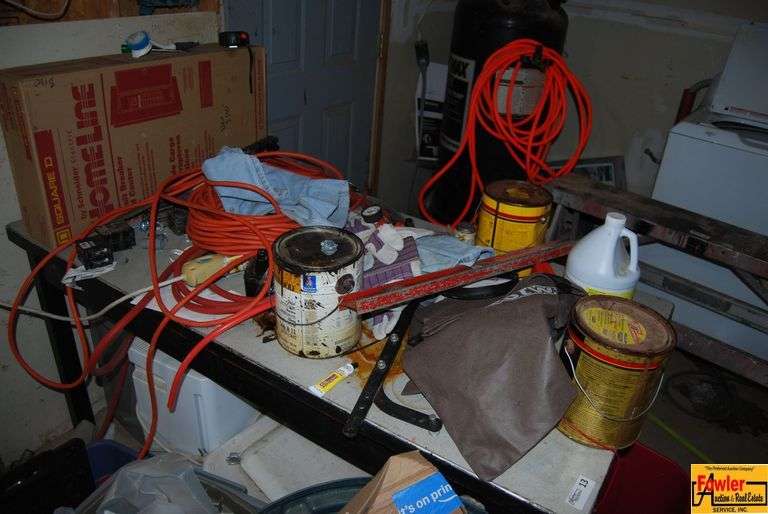 Contents of Garage - Paint Cans, Cords, and More image