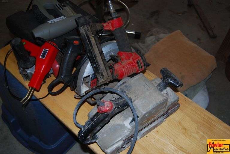 Assorted Power Tools - Task Force Stapler, Heat Gun, Skill Saw, and Sander image