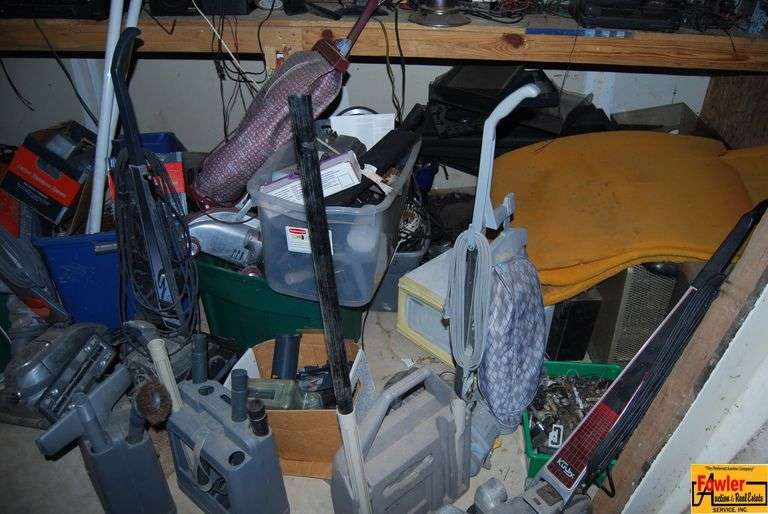Collection of Vintage Vacuum Cleaners and Electronics image