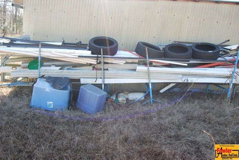 Group of Used Tires and Assorted Building Materials image