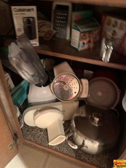 Kitchenware In Cabinets image