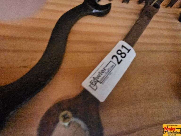 Collection of Various Hand Tools Including Saw and Wrenches