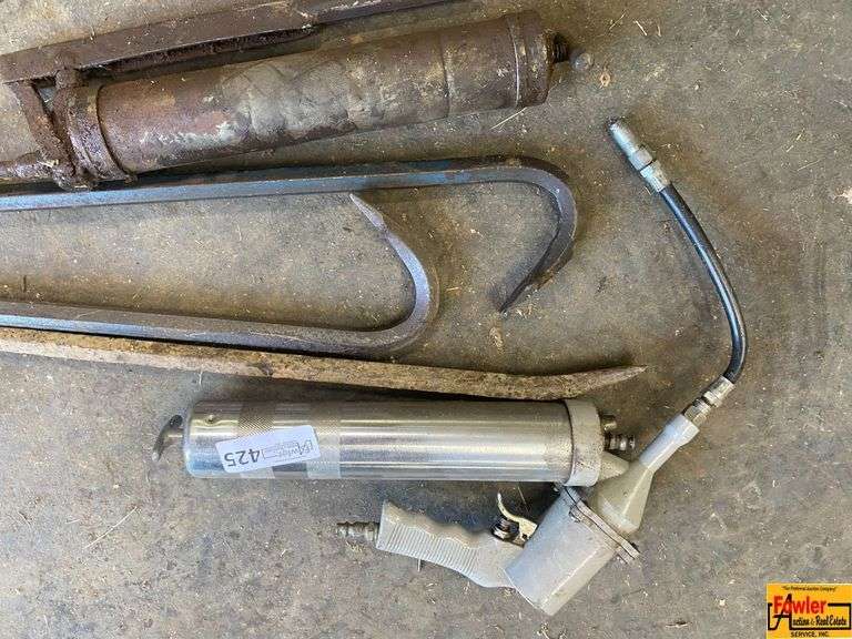 Assorted Tools: Grease Guns and Pry Bars