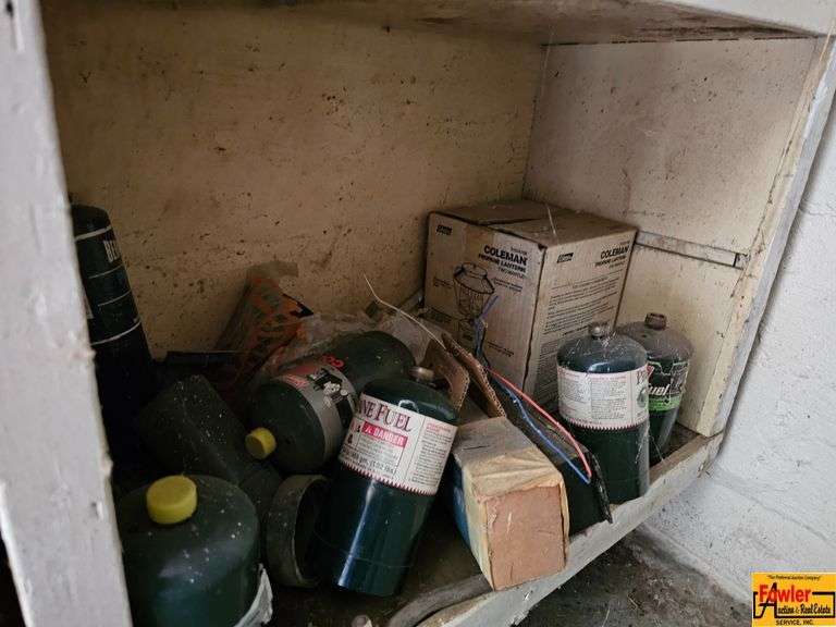 Shelving Unit Contents Including Assorted Parts, Tools, and Oil