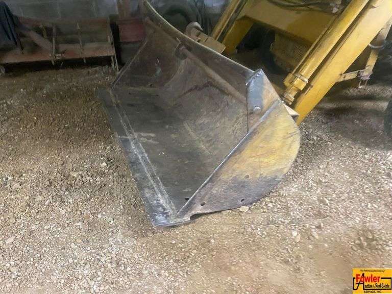 Ford 4000 Tractor with Loader and Bobcat Backhoe Attachment (running condition when stored)