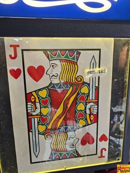 Pepsi-Cola Sign, Winston Calendar, and Jack of Hearts Display