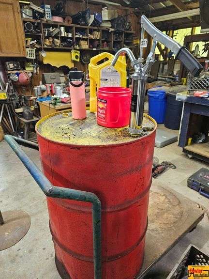 Rolling Oil Drum with Hand Pump, Canister, and Jug