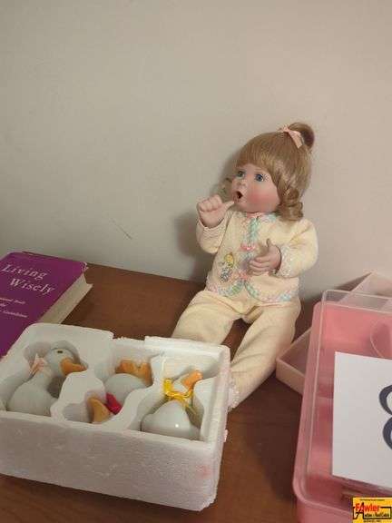 Doll, Goose Figurines, Thread, and More