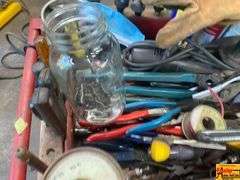 Red Tool Cart with Various Tools and Supplies