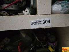 Shelving Unit Contents Including Assorted Parts, Tools, and Oil