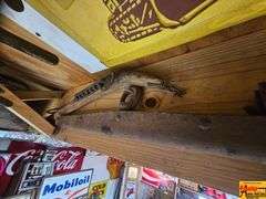 Collection of Advertising Signs, Tools, and Equipment