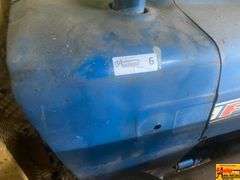 Ford 4000 Tractor with Loader and Bobcat Backhoe Attachment (running condition when stored)