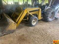 Ford 4000 Tractor with Loader and Bobcat Backhoe Attachment (running condition when stored)