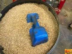 Husqvarna Brute Rolling Container with Wood Shavings