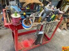 Red Tool Cart with Various Tools and Supplies
