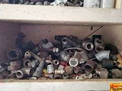 Shelving Unit Contents Including Assorted Parts, Tools, and Oil