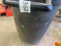 Husqvarna Brute Rolling Container with Wood Shavings