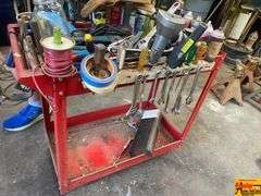 Red Tool Cart with Various Tools and Supplies