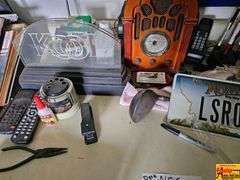 Collection of Mixed Items Including Radio, Tools, and Decor
