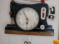 Singer 150th Anniversary Metal Sign & Sewing Machine Clock