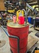 Rolling Oil Drum with Hand Pump, Canister, and Jug