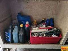 Shelving Unit Contents Including Assorted Parts, Tools, and Oil