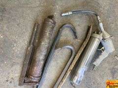 Assorted Tools: Grease Guns and Pry Bars