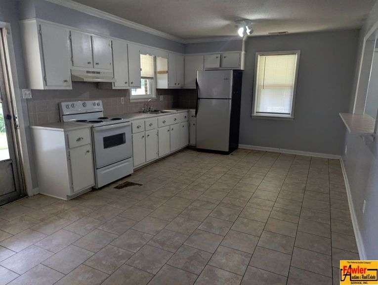 Cozy 3-Bedroom Brick Home & Lot In Convenient Location
