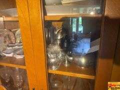 Contents Of Cabinet:  Metal Pitcher & Tea Pot, Glass Stemware