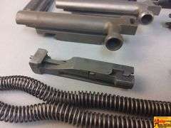2 Triggers, 2 Bolts, 2 Springs, 2 Trigger Covers