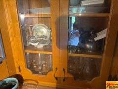 Contents Of Cabinet:  Metal Pitcher & Tea Pot, Glass Stemware
