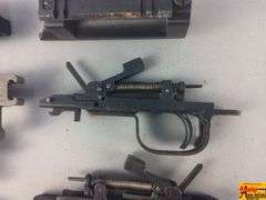 2 Triggers, 2 Bolts, 2 Springs, 2 Trigger Covers